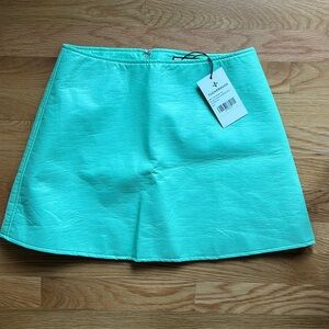 Tuckernuck faux leather Meg Mini skirt in mint chip.